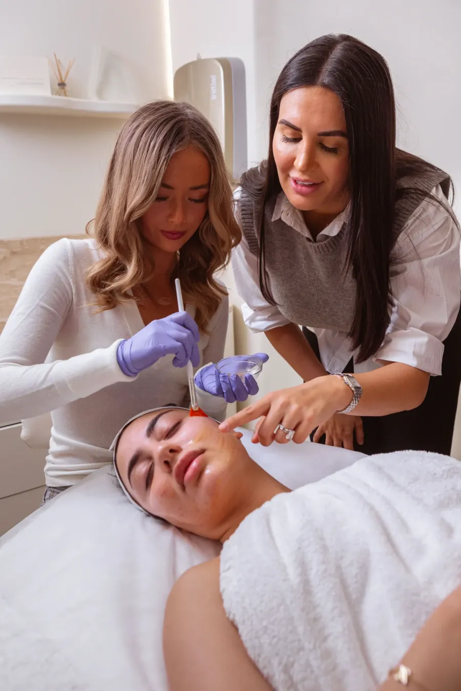 An educator guiding a student through a treatment